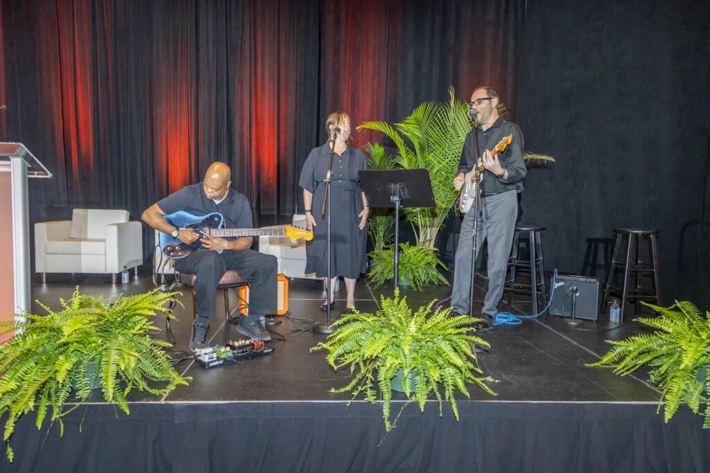 KAA member Daniel Hunt performs with Brad Meinerding and Sarah Meinerding at Ken and Friends 2026