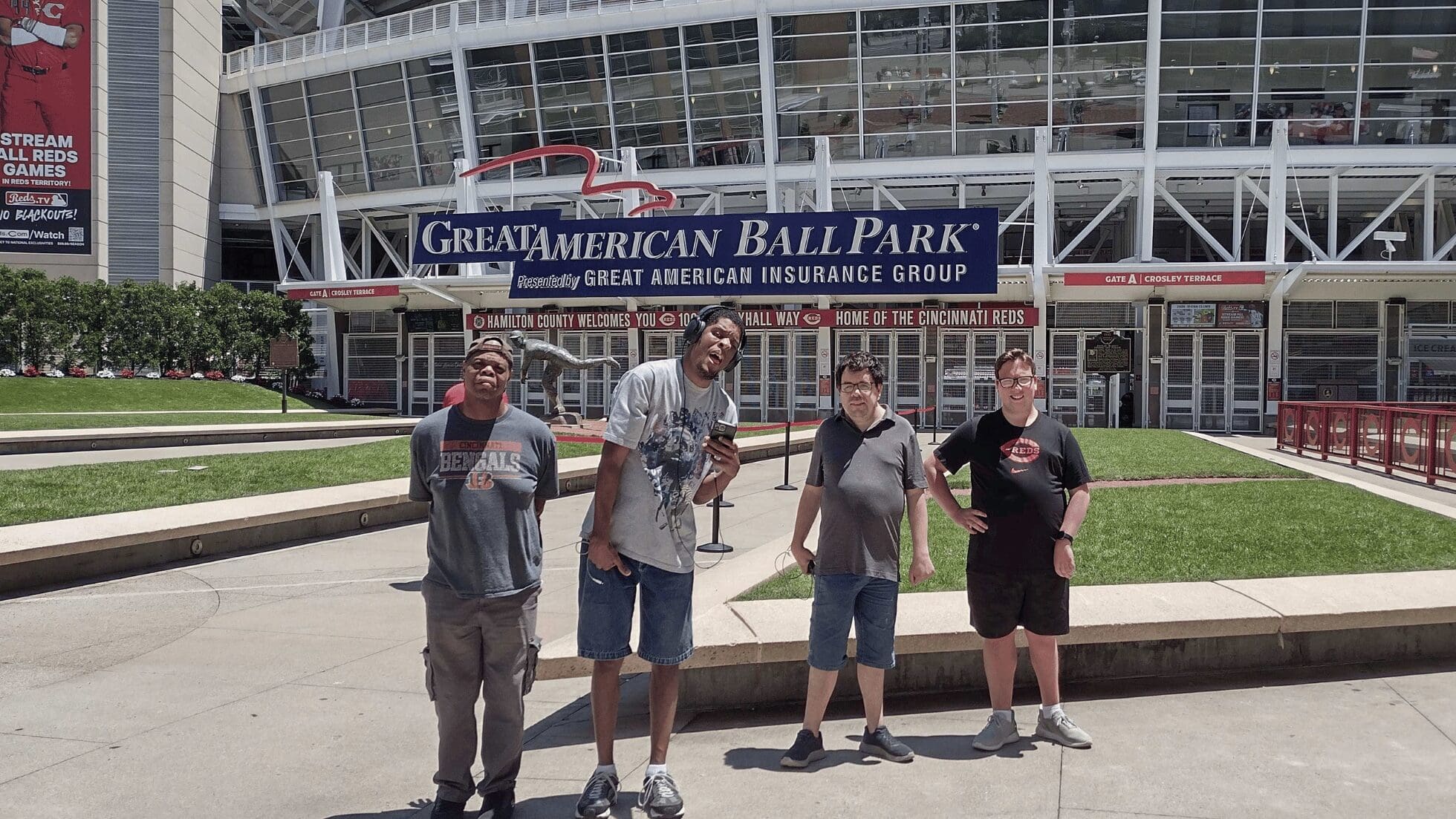 KAA members pose with the Cincinnati Reds mascot during a group outing