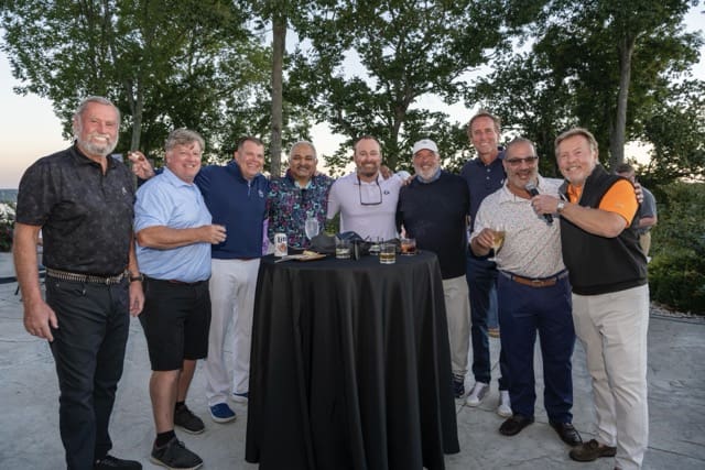 Golfers celebrating together at the KAA Golf Classic awards celebration