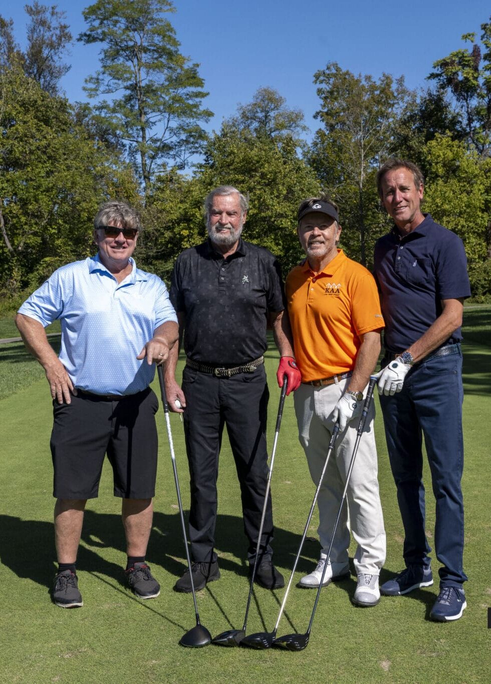 A team ready to play at the KAA Golf Classic